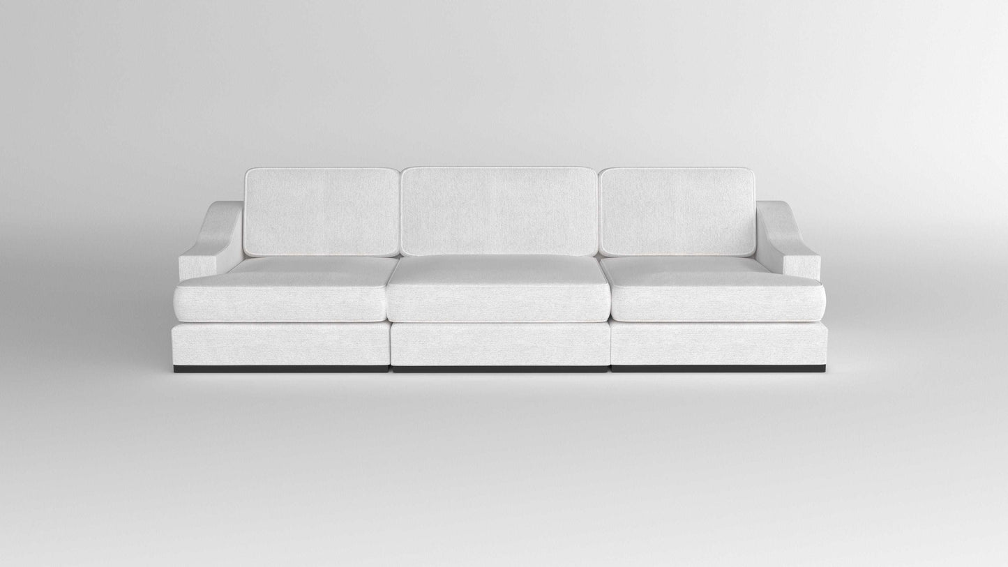Modern three-seater sofa with sloped arms in light fabric, minimalist background