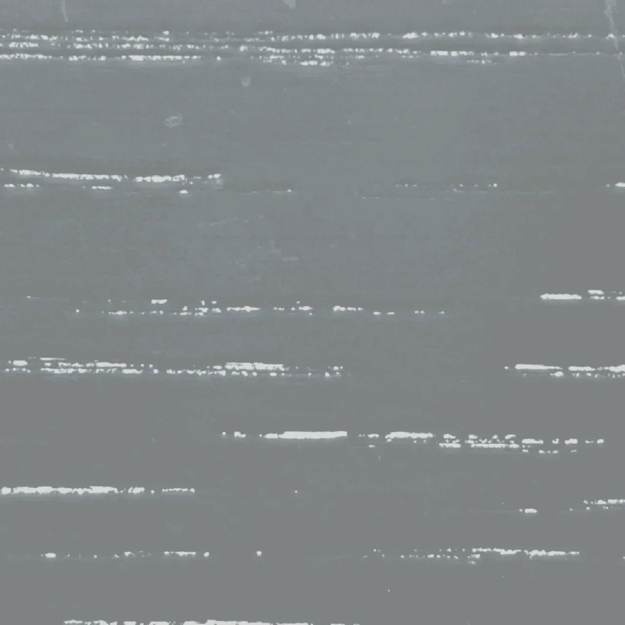 Textured grey wood grain surface, ideal for luxury handcrafted furniture finishes