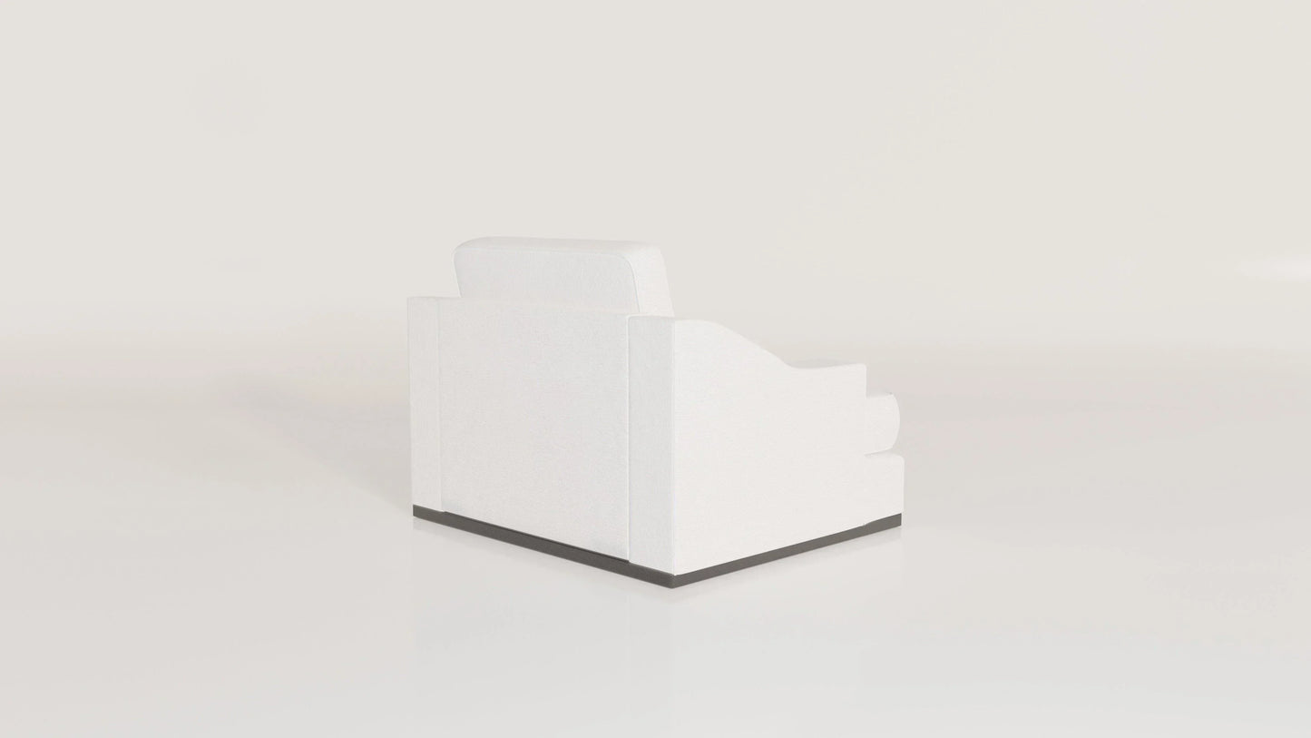 Modern white armchair with sloped armrest and black base on plain background