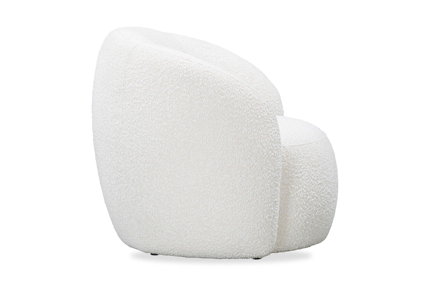 Modern boucle fabric armchair with curved backrest and plush texture in white