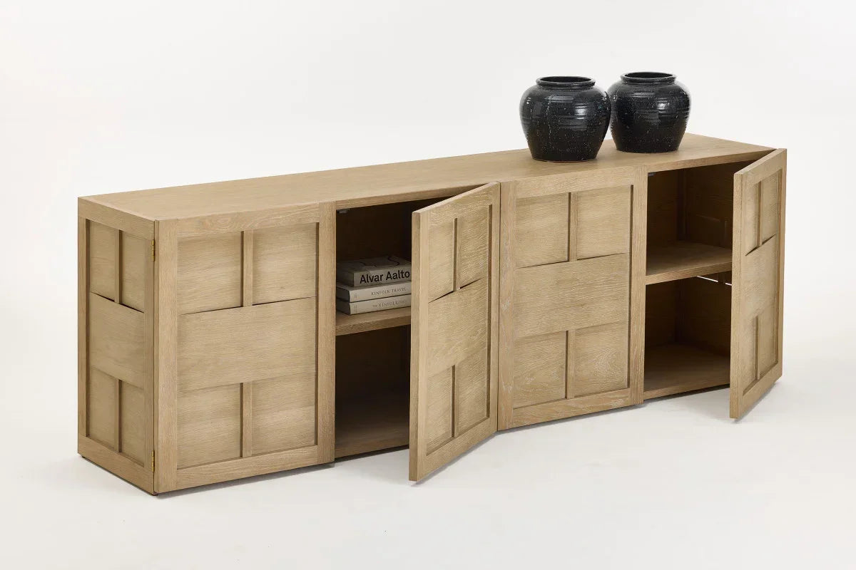 Light oak sideboard with panelled doors, open shelving, and two black ceramic vases on top
